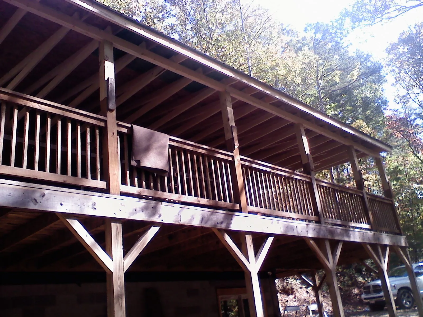 Timber framing under a new elevated porch and deck — Roof Leak Repair in Springport by Roofing Brothers